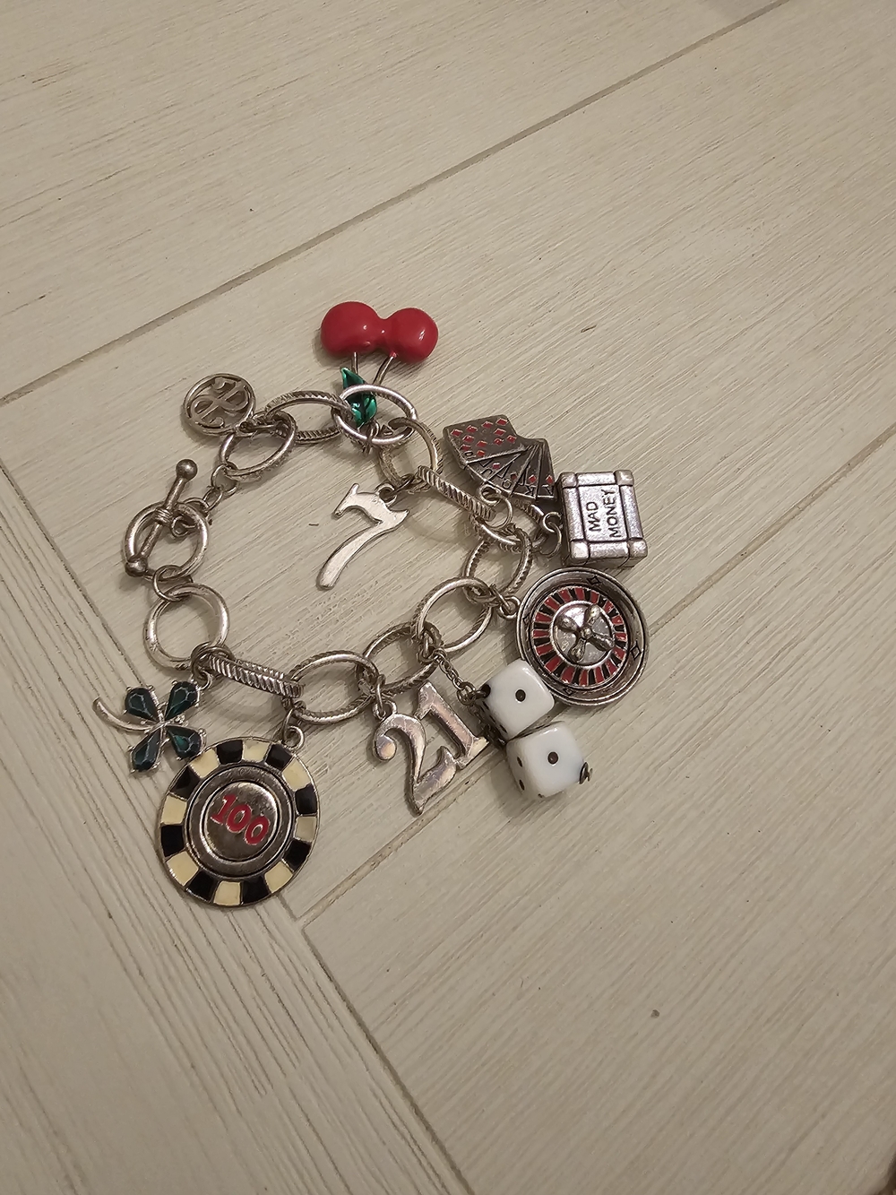 Silver-tone Casino Charm Bracelet with Red and White Accents